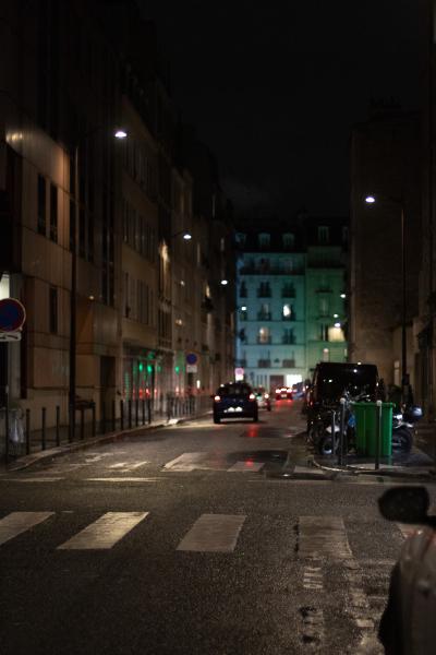 Night city streets in Paris, France